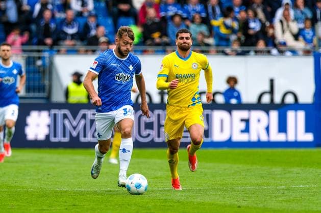 Killian Corredor(SV Darmstadt 98, 34) am Ball, daneben Fabio Di Michele Sanchez (Eintracht Braunschweig, 22), GER, SV Darmstadt 98 vs. Eintracht Braunschweig, Fussball, 2. Bundesliga, 5. Spieltag, Spielzeit 2024 2025, 14.09.2024. DFL DFB REGULATIONS PROHIBIT ANY USE OF PHOTOGRAPHS as IMAGE SEQUENCES and or QUASI-VIDEO. GER, SV Darmstadt 98 vs. Eintracht Braunschweig, Fussball, 2. Bundesliga, 5. Spieltag, Spielzeit 2024 2025, 14.09.2024. Darmstadt