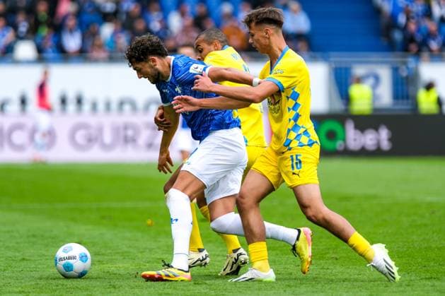 Fraser Hornby (SV Darmstadt 98, 09) in Action mit Max Marie (Eintracht Braunschweig, 15) und Leon Bell Bell (Eintracht Braunschweig, 19), GER, SV Darmstadt 98 vs. Eintracht Braunschweig, Fussball, 2. Bundesliga, 5. Spieltag, Spielzeit 2024 2025, 14.09.2024. DFL DFB REGULATIONS PROHIBIT ANY USE OF PHOTOGRAPHS as IMAGE SEQUENCES and or QUASI-VIDEO. GER, SV Darmstadt 98 vs. Eintracht Braunschweig, Fussball, 2. Bundesliga, 5. Spieltag, Spielzeit 2024 2025, 14.09.2024. Darmstadt