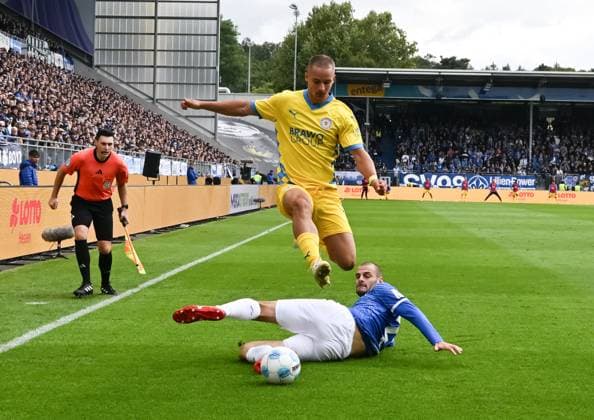 14.09.2024, xsltx, Fussball 2.Bundesliga, SV Darmstadt 98 - Eintracht Braunschweig emspor, v.l. Max Marie (Eintracht Braunschweig), Aleksandar Vukotic (SV Darmstadt 98) (DFL DFB REGULATIONS PROHIBIT ANY USE OF PHOTOGRAPHS as IMAGE SEQUENCES and or QUASI-VIDEO) Darmstadt