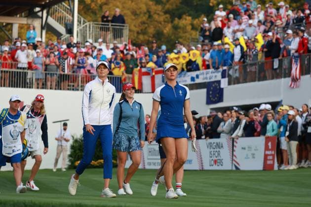 GAINESVILLE, VA - SEPTEMBER 14: From left to right Team Europe golfers Esther Henseleit and Charley Hull walk the first hole during Saturday Foursomes during the 2024 Solheim Cup on September 14, 2024 at Robert Trent Jones Golf Club at Gainesville, Virginia. (Photo by Brian Spurlock Icon Sportswire) GOLF: SEP 14 Solheim Cup EDITORIAL USE ONLY Icon24091434