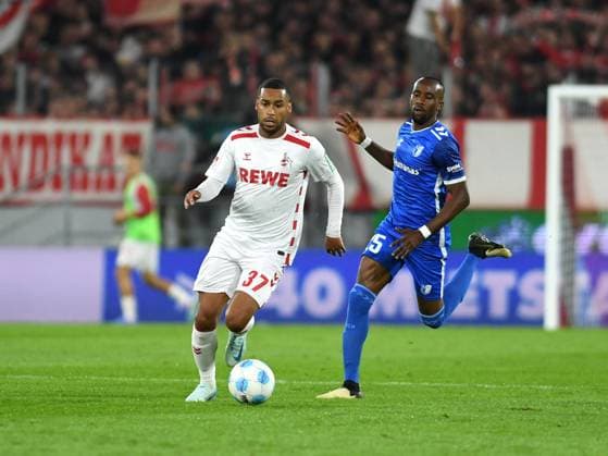 14.09.2024, Cologne, Germany, RheinEnergieStadion, 1. FC Köln vs 1. FC Magdeburg - 2. Bundesliga, Linton Maina (1. FC Koeln) und Silas Gnaka (1. FC Magdeburg) im Zweikampf (Foto Ralf Treese) DFB DFL REGULATIONS PROHIBIT ANY USE OF PHOTOGRAPHS AS IMAGE SEQUENCES AND OR QUASI-VIDEO. Cologne RheinEnergieStadion North Rhine-Westphalia Germany
