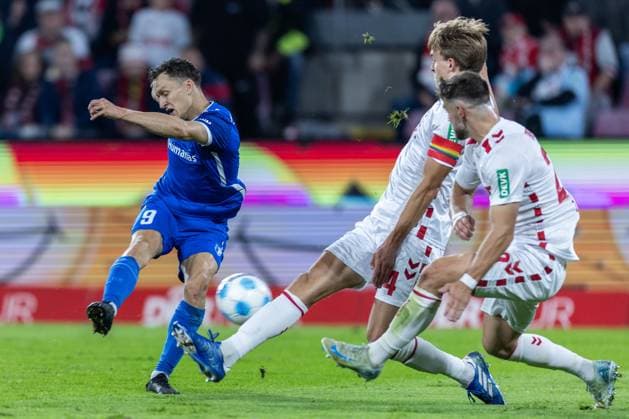 Fußball 2. Bundesliga 5. Spieltag 1. FC Köln - 1. FC Magdeburg am 14.09.2024 im RheinEnergieStadion in Köln Martijn Kaars ( Magdeburg ), links - Timo Hübers ( Köln ), mitte - Jan Thielmann ( Köln ), rechts DFB regulations prohibit any use of photographs as image sequences and or quasi-video.
