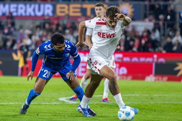 Fußball 2. Bundesliga 5. Spieltag 1. FC Köln - 1. FC Magdeburg am 14.09.2024 im RheinEnergieStadion in Köln Xavier Amaechi ( Magdeburg ), links - Julian Pauli ( Köln ), rechts DFB regulations prohibit any use of photographs as image sequences and or quasi-video.