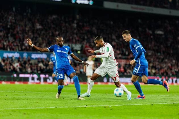 2. Fußball Bundesliga: 1. FC Köln - 1. FC Magdeburg; 14.09.2024 Zweikampf Silas Gnaka (1. FC Magdeburg, 25), Linton Maina (1. FC Köln, 37) am Ball, Andi Hoti (1. FC Magdeburg, 3) 2. Fußball Bundesliga, 1. FC Köln - 1. FC Magdeburg, Köln, Rheinenergiestadion am 14.09.2024 DFL REGULATIONS PROHIBIT ANY USE OF PHOTOGRAPHS AS IMAGE SEQUENCES AND OR QUASI-VIDEO.
