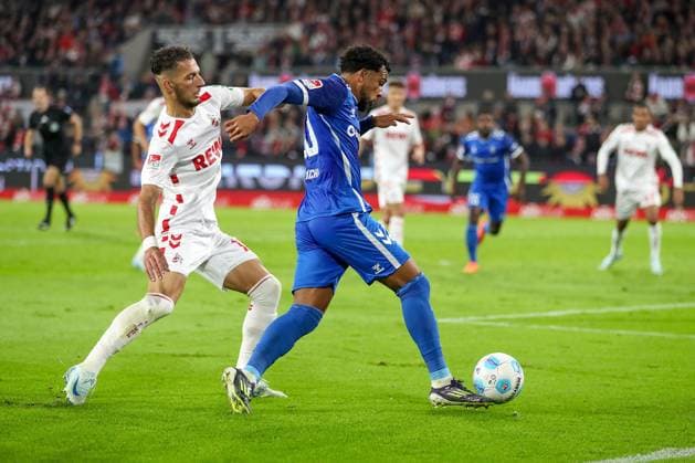 14.09.2024, 2. Fußball Bundesliga, 1. FC Köln - 1. FC Magdeburg, RheinEnergieSTADION, Saison 2024 2025: Zweikampf Dejan Ljubicic (1.FC Köln 7) gegen Xavier Amaechi (1.FC Magdeburg 20) DFB regulations prohibit any use of photographs as image sequences and or quasi-video. Nordrhein-Westfalen Deutschland