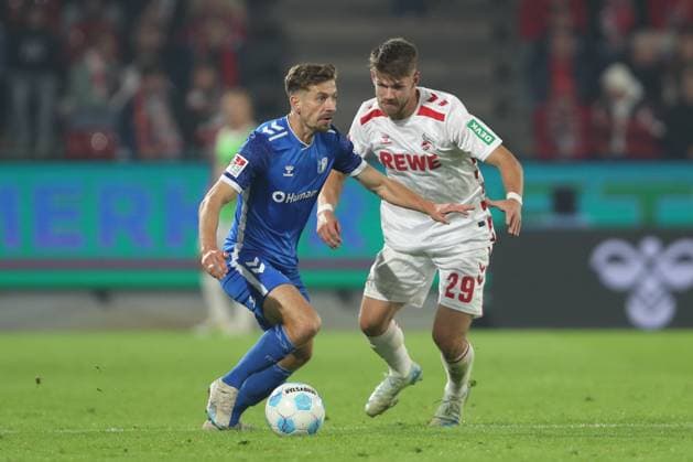 Alexander Nollenberger (1.FC Magdeburg) und Jan Thielmann (1. FC Koeln) im Zweikampf waehrend des Spiels der 2. Bundesliga zwischen 1. FC Köln und 1. FC Magdeburg im RheinEnergieStadion am 14. September 2024 in Köln, Deutschland. (Foto von Oliver Kaelke DeFodi Images) +++ Alexander Nollenberger (1.FC Magdeburg) und Jan Thielmann (1. FC Koeln) battle for the ball during the 2. Bundesliga match between 1. FC Köln and 1. FC Magdeburg at RheinEnergieStadion on September 14, 2024 in Cologne, Germany. (Photo by Oliver Kaelke DeFodi Images) DFB DFL REGULATIONS PROHIBIT ANY USE OF PHOTOGRAPHS AS IMAGE SEQUENCES AND OR QUASI-VIDEO. Defodi-678_2024_09_14_OK_KOEFCM_1154