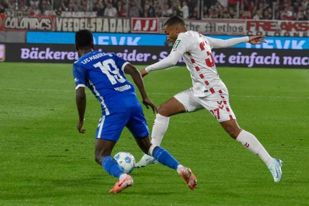 v. li. im Zweikampf Lubambo Musonda (Magdeburg 19) Linton Maina (Koeln 37) 14.09.2024 Fussball 1. FC Koeln vs 1. FC Magdeburg, Rheinenergiestadion, Koeln, DFB DFL REGULATIONS PROHIBIT ANY USE OF PHOTOGRAPHS AS IMAGE SEQUENCES AND OR QUASI-VIDEO NRW Germany