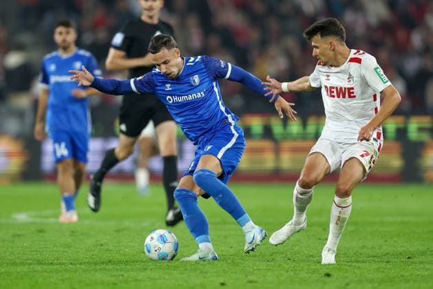 14.09.2024, 2. Fußball Bundesliga, 1. FC Köln - 1. FC Magdeburg, RheinEnergieSTADION, Saison 2024 2025: Zweikampf Falko Michel (1.FC Magdeburg 21) gegen Dejan Ljubicic (1.FC Köln 7) DFB regulations prohibit any use of photographs as image sequences and or quasi-video. Nordrhein-Westfalen Deutschland