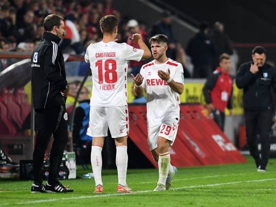14.09.2024, Cologne, Germany, RheinEnergieStadion, 1. FC Köln vs 1. FC Magdeburg - 2. Bundesliga, Rasmus Carstensen (1. FC Koeln) und Jan Thielmann (1. FC Koeln) Spielerwechsel (Foto Ralf Treese) DFB DFL REGULATIONS PROHIBIT ANY USE OF PHOTOGRAPHS AS IMAGE SEQUENCES AND OR QUASI-VIDEO. Cologne RheinEnergieStadion North Rhine-Westphalia Germany