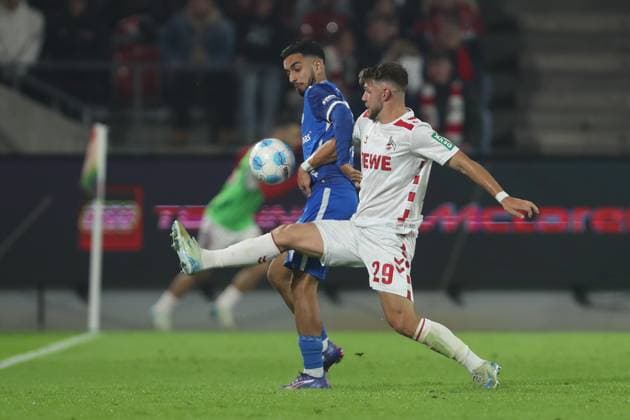 Falko Michel (1.FC Magdeburg) und Dejan Ljubicic (1. FC Koeln) im Zweikampf waehrend des Spiels der 2. Bundesliga zwischen 1. FC Köln und 1. FC Magdeburg im RheinEnergieStadion am 14. September 2024 in Köln, Deutschland. (Foto von Oliver Kaelke DeFodi Images) +++ Falko Michel (1.FC Magdeburg) und Dejan Ljubicic (1. FC Koeln) battle for the ball during the 2. Bundesliga match between 1. FC Köln and 1. FC Magdeburg at RheinEnergieStadion on September 14, 2024 in Cologne, Germany. (Photo by Oliver Kaelke DeFodi Images) DFB DFL REGULATIONS PROHIBIT ANY USE OF PHOTOGRAPHS AS IMAGE SEQUENCES AND OR QUASI-VIDEO. Defodi-678_2024_09_14_OK_KOEFCM_1219