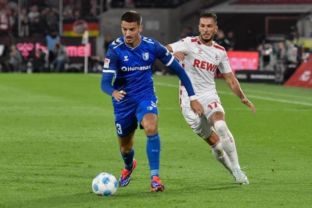 v. li. im Zweikampf Andi Hoti (Magdeburg 3) Leart Pacarada (Koeln 17) 14.09.2024 Fussball 1. FC Koeln vs 1. FC Magdeburg, Rheinenergiestadion, Koeln, DFB DFL REGULATIONS PROHIBIT ANY USE OF PHOTOGRAPHS AS IMAGE SEQUENCES AND OR QUASI-VIDEO NRW Germany