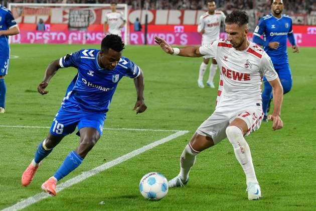 v. li. im Zweikampf Lubambo Musonda (Magdeburg 19) Leart Pacarada (Koeln 17) 14.09.2024 Fussball 1. FC Koeln vs 1. FC Magdeburg, Rheinenergiestadion, Koeln, DFB DFL REGULATIONS PROHIBIT ANY USE OF PHOTOGRAPHS AS IMAGE SEQUENCES AND OR QUASI-VIDEO NRW Germany