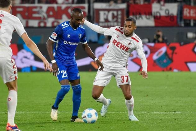 v. li. im Zweikampf Silas Gnaka (Magdeburg 25 Linton Maina (Koeln 37) 14.09.2024 Fussball 1. FC Koeln vs 1. FC Magdeburg, Rheinenergiestadion, Koeln, DFB DFL REGULATIONS PROHIBIT ANY USE OF PHOTOGRAPHS AS IMAGE SEQUENCES AND OR QUASI-VIDEO NRW Germany