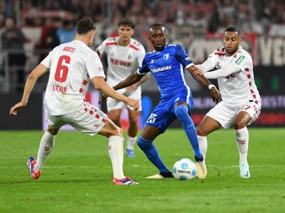 14.09.2024, Cologne, Germany, RheinEnergieStadion, 1. FC Köln vs 1. FC Magdeburg - 2. Bundesliga, Eric Martel (1. FC Koeln), Silas Gnaka (1. FC Magdeburg) und Linton Maina (1. FC Koeln) im Zweikampf (Foto Ralf Treese) DFB DFL REGULATIONS PROHIBIT ANY USE OF PHOTOGRAPHS AS IMAGE SEQUENCES AND OR QUASI-VIDEO. Cologne RheinEnergieStadion North Rhine-Westphalia Germany