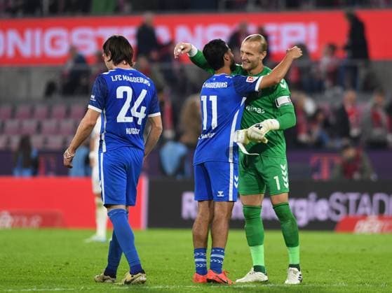 14.09.2024, Cologne, Germany, RheinEnergieStadion, 1. FC Köln vs 1. FC Magdeburg - 2. Bundesliga, Mohammed El Hankouri (1. FC Magdeburg) und Torwart Dominik Reimann (1. FC Magdeburg) Jubel, jubelt, jubeln (Foto Ralf Treese) DFB DFL REGULATIONS PROHIBIT ANY USE OF PHOTOGRAPHS AS IMAGE SEQUENCES AND OR QUASI-VIDEO. Cologne RheinEnergieStadion North Rhine-Westphalia Germany