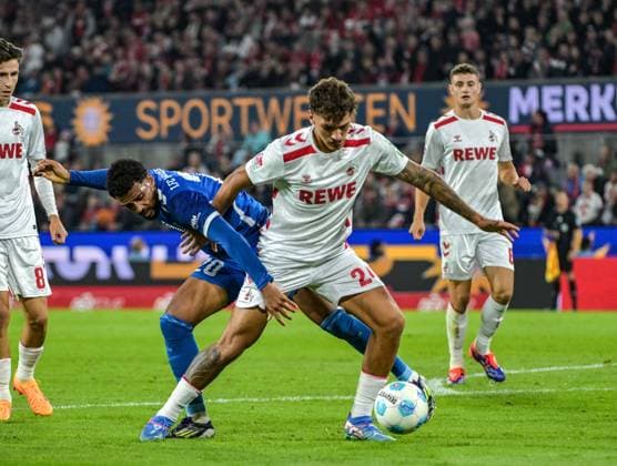 14.09.2024, xjpx, Fussball 2.Bundesliga, 1.FC Koeln - 1.FC Magdeburg emspor, v.l. Zweikampf zwischen Xavier Amaechiv (Magdeburg) und Julian Pauli (Koeln) (DFL DFB REGULATIONS PROHIBIT ANY USE OF PHOTOGRAPHS as IMAGE SEQUENCES and or QUASI-VIDEO) Koeln