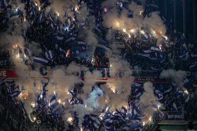 14.09.2024, xjpx, Fussball 2.Bundesliga, 1.FC Koeln - 1.FC Magdeburg emspor, v.l. Fans aus Magdeburg mit Pyro-Show im Gästeblock (DFL DFB REGULATIONS PROHIBIT ANY USE OF PHOTOGRAPHS as IMAGE SEQUENCES and or QUASI-VIDEO) Koeln