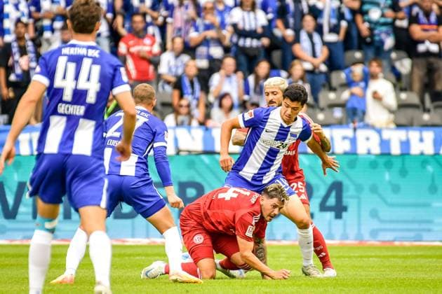 15.09.2024, xlakx, Fussball 2.Bundesliga, Hertha BSC Berlin - Fortuna Düsseldorf emspor, v.l. Dawid Kownacki (Fortuna Düsseldorf 24),Ibrahim Maza (Hertha BSC 10),Matthias Zimmermann (Fortuna Düsseldorf 25),Zweikampf, Duell, Kampf, tackle (DFL DFB REGULATIONS PROHIBIT ANY USE OF PHOTOGRAPHS as IMAGE SEQUENCES and or QUASI-VIDEO) Daniel Lakomski Jan Huebner Berlin
