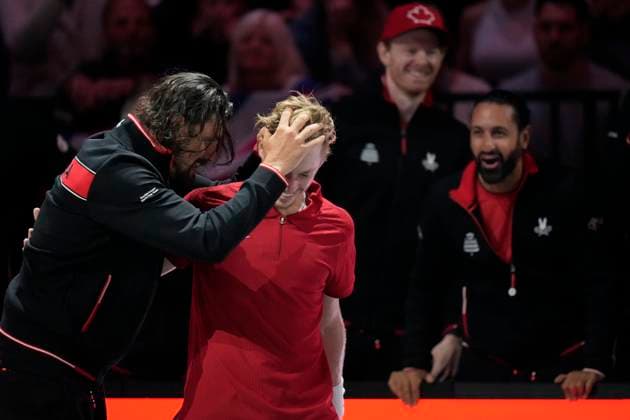 Tennis, Davis Cup, GroÃŸbritannien - Kanada 15th September 2024; AO Arena, Manchester, England; Davis Cup Finals, Group Stage, Group D Day 6; Frank Dancevic, Captain of Canada hugs Denis Shapovalov of Canada after his victory over Daniel Evans of Great Britain took Canada to the Finals of the Davis Cup in Malaga later this year  ActionPlus12693179 StevenxFlynn