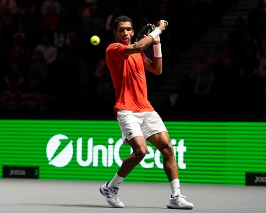 15th September 2024; AO Arena, Manchester, England; Davis Cup Finals, Group Stage, Group D Day 6; Felix Auger-Aliassime of Canada plays a backhand shot  ActionPlus12693626 StevenxFlynn