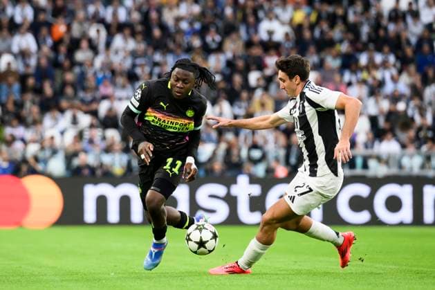 Juventus FC v PSV Eindhoven - UEFA Champions League Johan Bakayoko of PSV Eindhoven competes for the ball with Andrea Cambiaso of Juventus FC during the UEFA Champions League football match between Juventus FC and PSV Eindhoven. Turin Italy Copyright: xNicolòxCampox