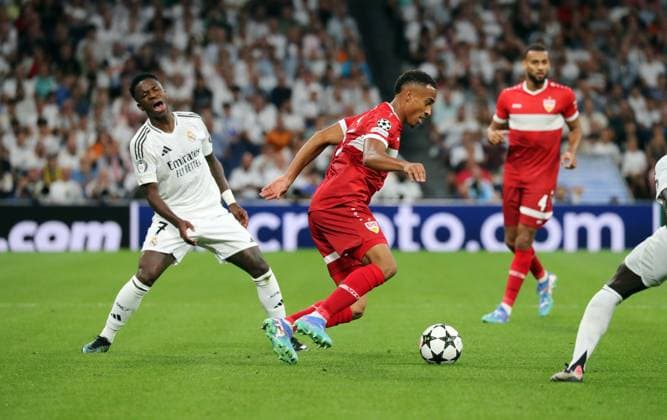 17.09.24 Real Madrid - VfB Stuttgart Spanien, Madrid, 17.09.2024, Fussball, UEFA Champions League, Real Madrid - VfB Stuttgart: v.l. Vinicius Junior (Real Madrid), Jamie Leweling (VfB Stuttgart).