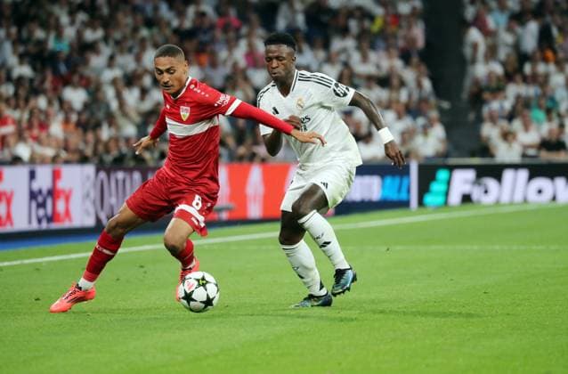 17.09.24 Real Madrid - VfB Stuttgart Spanien, Madrid, 17.09.2024, Fussball, UEFA Champions League, Real Madrid - VfB Stuttgart: v.l. Enzo Millot (VfB Stuttgart), Vinicius Junior (Real Madrid).