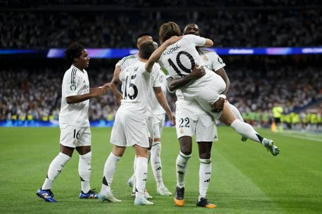 MADRID, SPAIN - SEPTEMBER 17: Antonio Rudiger of Real Madrid and Luka Modric of Real Madrid celebrates a goal during the UEFA CHAMPIONS LEAGUE 2024 25 match between Real Madrid and VfB Stuttgart at Santiago Bernabeu Stadium. PLEASExDONTxSENDxTOxIMAGOx!!  (266904825)