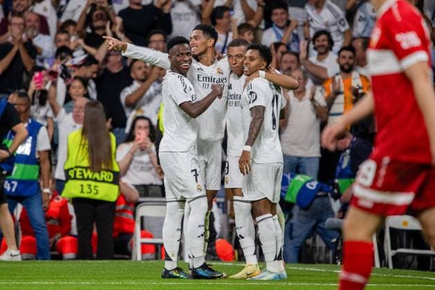 Real Madrid CF and Stuttgart VFB at the Santiago BernabÈu Stadium in Madrid - 17 Sep 2024 From left to right, Vinicius Jr, Jude Bellingham, Kylian MbappÈ and Rodrigo celebrate a goal for their team during the UEFA Champions League group stage match 2024 25 UEFA Champions League group stage match between Real Madrid CF and VfB Stuttgart at Santiago BernabÈu Stadium Real Madrid defeated Stuttgart tonight at the Santiago Bernabeu stadium by 3 goals to 1 in the first match of the 2024-2025 UEFA Champions League. Madrid Spain Copyright: xDavidxCanalesx xSOPAxImagesx DCRealMadridSttutgart240917-042