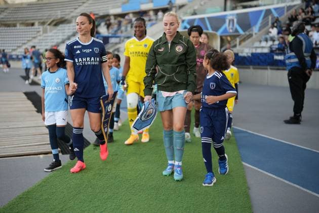Gaetane Thiney of Paris FC and Alex Greenwood of Man City lead their sides out Paris FC Women v Manchester City Women, UEFA Women s Champions League, Second Round, Football, Stade Charlety , Paris, France, 18 Sep 2024 EDITORIAL USE ONLY No use with unauthorised audio, video, data, fixture lists, club league logos or live services. Online in-match use limited to 120 images, no video emulation. No use in betting, games or single club league player publications. Copyright: xDavexWinter Shutterstockx 14722161aa