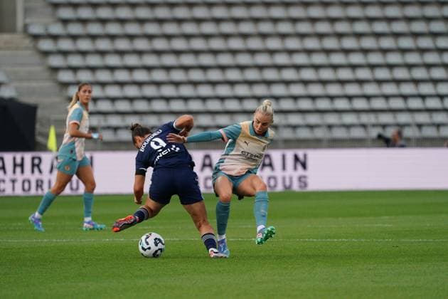 Mathilde Bourdieu of Paris FC is tackled by Alex Greenwood of Man City Paris FC Women v Manchester City Women, UEFA Women s Champions League, Second Round, Football, Stade Charlety , Paris, France, 18 Sep 2024 EDITORIAL USE ONLY No use with unauthorised audio, video, data, fixture lists, club league logos or live services. Online in-match use limited to 120 images, no video emulation. No use in betting, games or single club league player publications. Copyright: xDavexWinter Shutterstockx 14722161aq
