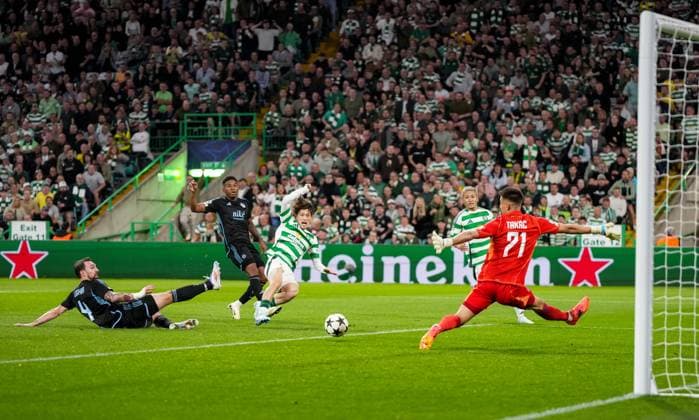 Kyogo Furuhashi of Celtic shoots wide of Slovan Bratislava goalkeeper Dominik Tabac s goal. Celtic v Slovan Bratislava, UEFA Champions League, Group Stage, Football, Celtic Park, Glasgow, Scotland, UK, 18 Sep 2024 EDITORIAL USE ONLY No use with unauthorised audio, video, data, fixture lists, club league logos or live services. Online in-match use limited to 120 images, no video emulation. No use in betting, games or single club league player publications. Copyright: xStuartxWallace Shutterstockx 14722221r