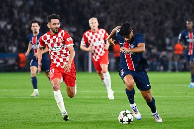 Asensio Marco ( 11 - PSG ) and Ivan Martin ( 23 - Girona ) during the UEFA Champions League match between Paris Saint Germain and Girona FC at Parc Des Princes on September 18, 2024 in Paris, France. ( Photo by federico pestellini panoramic ) - FOOTBALL : PSG vs Girona - Ligue des Champions - 18 09 2024 FedericoPestellini Panoramic 