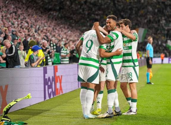 Adam Idah of Celtic celebrates with Auston Trusty of Celtic and team mates after scoring to give Celtic a 5-1 lead. Celtic v Slovan Bratislava, UEFA Champions League, Group Stage, Football, Celtic Park, Glasgow, Scotland, UK, 18 Sep 2024 EDITORIAL USE ONLY No use with unauthorised audio, video, data, fixture lists, club league logos or live services. Online in-match use limited to 120 images, no video emulation. No use in betting, games or single club league player publications. Copyright: xStuartxWallace Shutterstockx 14722221bo