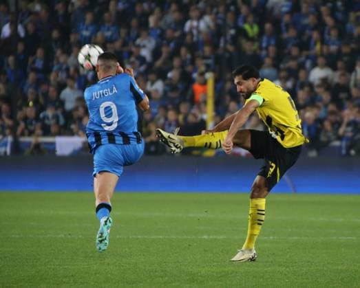 18.09.2024, xgrfx, Fussball UEFA Champions League, Club Brügge - Borussia Dortmund emspor, v.l. Ferran Jutgla (Club Brügge), Emre Can (Borussia Dortmund) (DFL DFB REGULATIONS PROHIBIT ANY USE OF PHOTOGRAPHS as IMAGE SEQUENCES and or QUASI-VIDEO) Brügge