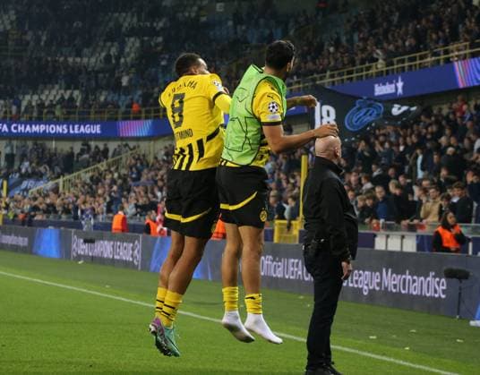 18.09.2024, xgrfx, Fussball UEFA Champions League, Club Brügge - Borussia Dortmund emspor, v.l. Felix Nmecha, Ramy Bensebaini (Borussia Dortmund) (DFL DFB REGULATIONS PROHIBIT ANY USE OF PHOTOGRAPHS as IMAGE SEQUENCES and or QUASI-VIDEO) Brügge