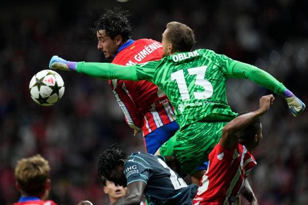Jan Oblak of Atletico de Madrid and Jose Gimenez of Atletico de Madrid Atletico de Madrid v RB Leipzig, UEFA Champios League match, date 1. Football, Civitas Metropolitano Stadium, Madrid, Spain - 19 Sep 2024 Editorial use only  Copyright: xPressinphoto Shutterstockx 14729545u