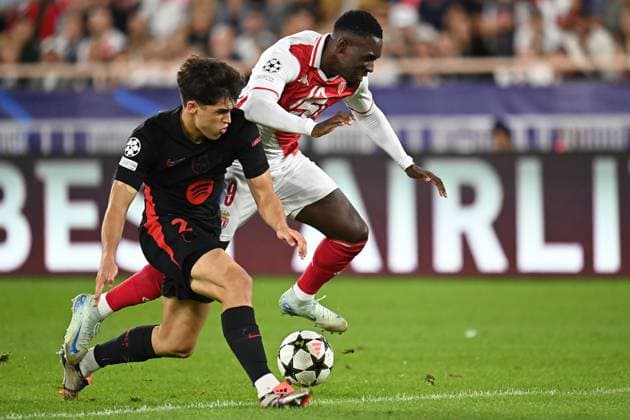 AS Monaco v FC Barcelona, Barca - UEFA Champions League 2024 25 League Phase MD1 Pau Cubarsi of FC Barcelona and Folarin Balogun of AS Monaco challenge during the UEFA Champions League 2024 25 League Phase MD1 match between AS Monaco and FC Barcelona at Stade Louis II on September 19, 2024 in Monaco, Monaco. Monaco Stade Louis II Monaco Monaco Copyright: xNealxSimpson Sportsphoto APLx 14048281