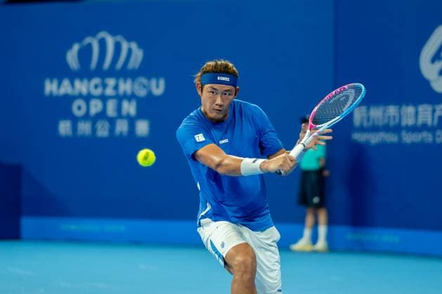 HANGZHOU, CHINA - SEPTEMBER 19: Zhang Zhizhen of China competes in the Men s Single Round of 32 match against Denis Yevseyev of Kazakhstan on day 2 of 2024 Hangzhou Open at the Hangzhou Olympic Sports Expo Center on September 19, 2024 in Hangzhou, Zhejiang Province of China.  Copyright: xVCGx 111518929682