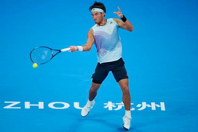 HANGZHOU, CHINA - SEPTEMBER 19: Bu Yunchaokete of China competes in the Men s Single Round of 32 match against Hugo Gaston of France on day 2 of 2024 Hangzhou Open at the Hangzhou Olympic Sports Expo Center on September 19, 2024 in Hangzhou, Zhejiang Province of China.  Copyright: xVCGx 111518875707