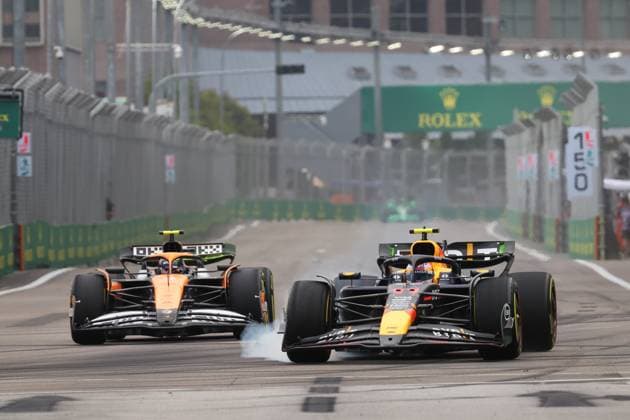 11 PEREZ Sergio (mex), Red Bull Racing RB20, action 04 NORRIS Lando (gbr), McLaren F1 Team MCL38, action during the Formula 1 Singapore Grand Prix 2024, 18th round of the 2024 Formula One World Championship, WM, Weltmeisterschaft from September 20 to 22, 2024 on the Marina Bay Circuit, in Singapore, Singapore - F1 - SINGAPORE GRAND PRIX 2024 DPPI Panoramic 240920_R18_SINGAPORE_DP_1G9A0803