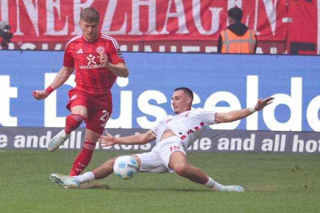 GER, 2. FBL. Fortuna Duesseldorf vs. 1. FC Koeln 21.09.2024, Merkur Spiel-Arena, Duesseldorf, GER, 2. FBL. Fortuna Duesseldorf vs. 1. FC Koeln, im Bild: Tim Rossmann (Fortuna Duesseldorf 21), im Zweikampf gegen Tim Lemperle (FC Koeln 19),