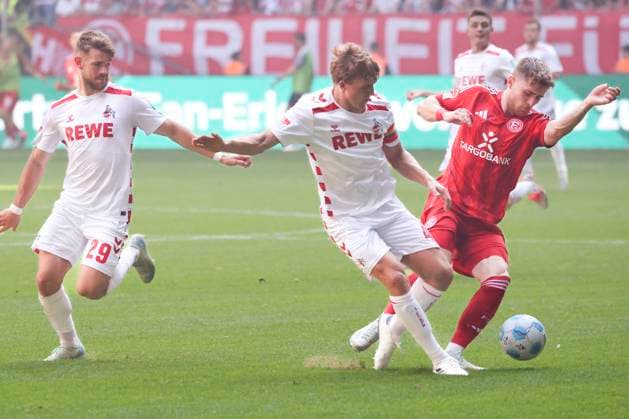 GER, 2. FBL. Fortuna Duesseldorf vs. 1. FC Koeln 21.09.2024, Merkur Spiel-Arena, Duesseldorf, GER, 2. FBL. Fortuna Duesseldorf vs. 1. FC Koeln, im Bild: Jan Thielmann (FC Koeln 29), Timo Hübers Huebers (FC Koeln 4), Tim Rossmann (Fortuna Duesseldorf 21),