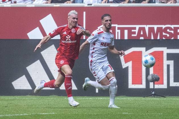 21.09.2024, Fussball: 2. Bundesliga, Saison 2024 2025, 06. Spieltag, Fortuna Duesseldorf vs. 1. FC Koeln in der Merkur-Spiel Arena Rhein in Duesseldorf. Zweikampf zwischen Felix Klaus (Fortuna Duesseldorf, 11) und Leart Pacarada (1. FC Koeln, 17). Wichtiger Hinweis: Gemaess den Vorgaben der DFL Deutsche Fussball Liga bzw. des DFB Deutscher Fussball-Bund ist es untersagt, in dem Stadion und oder vom Spiel angefertigte Fotoaufnahmen in Form von Sequenzbildern und oder videoaehnlichen Fotostrecken zu verwerten bzw. verwerten zu lassen. Foto: Kirchner-Media TH