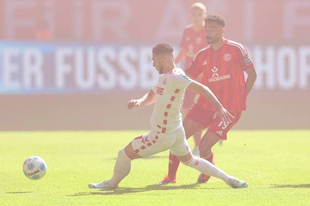 21.09.2024, 2. Fußball Bundesliga, Fortuna Düsseldorf - 1. FC Köln, Merkur Spiel-Arena, Saison 2024 2025: Leart Pacarada (1.FC Köln 17) gegen Emmanuel Iyoha (Fortuna Düsseldorf 19) DFB regulations prohibit any use of photographs as image sequences and or quasi-video. Nordrhein-Westfalen Deutschland