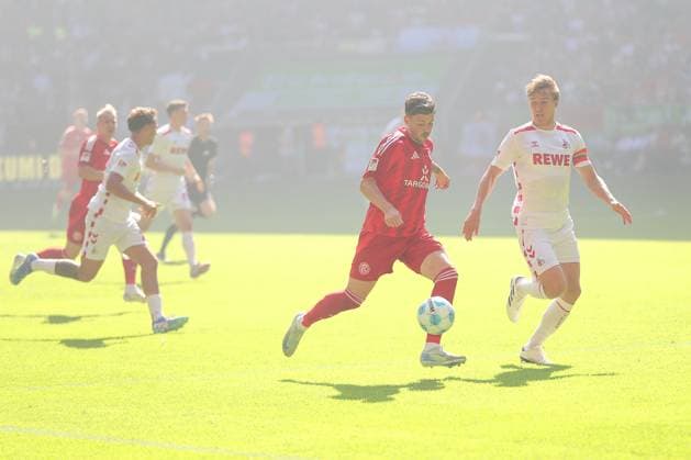 21.09.2024, 2. Fußball Bundesliga, Fortuna Düsseldorf - 1. FC Köln, Merkur Spiel-Arena, Saison 2024 2025: Zweikampf Dawid Kownacki (Fortuna Düsseldorf 24) gegen Timo Hübers (1.FC Köln 4) DFB regulations prohibit any use of photographs as image sequences and or quasi-video. Nordrhein-Westfalen Deutschland