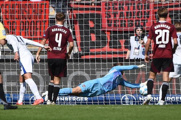 21.09.2024, xhbx, Fussball 2.Bundesliga, 1. FC Nuernberg - Hertha BSC Berlin emspor, v.l. Michael Cuisance (Hertha BSC Berlin), Finn Jeltsch (1.FC Nuernberg), Jan Reichert (1.FC Nuernberg), Caspar Jander (1.FC Nuernberg) (DFL DFB REGULATIONS PROHIBIT ANY USE OF PHOTOGRAPHS as IMAGE SEQUENCES and or QUASI-VIDEO) Nuernberg