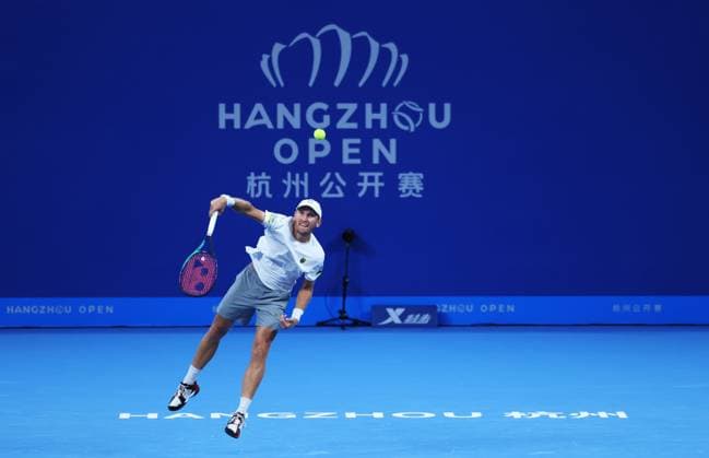 HANGZHOU, CHINA - SEPTEMBER 21: Mitchell Krueger of United States competes in the Men s Singles Round of 16 match against Roberto Carballes Baena of Spain on day 4 of 2024 Hangzhou Open at the Hangzhou Olympic Sports Expo Center on September 21, 2024 in Hangzhou, Zhejiang Province of China.  Copyright: xVCGx 111519298372