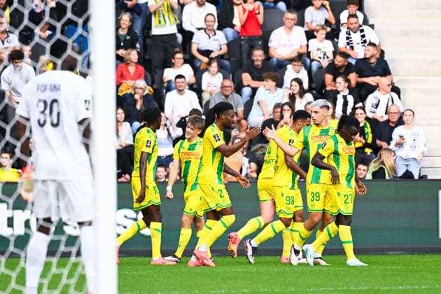 Johann Lepenant ( 8 - Nantes ) celebrates with teammates during the Ligue 1 match between Angers SCO and FC Nantes at Stade Raymond Kopa on September 22, 2024 in Angers, France. ( Photo by federico pestellini panoramic ) - FOOTBALL : Angers vs Nantes - Ligue 1 - 22 09 2024 FedericoPestellini Panoramic 