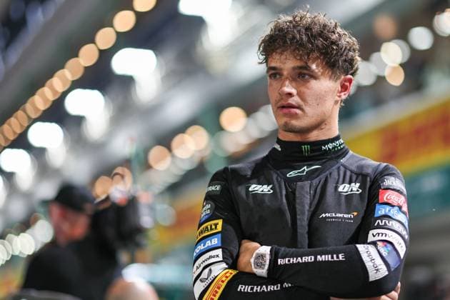 (240922) -- SINGAPORE, Sept. 22, 2024 -- McLaren s British driver Lando Norris is seen before the Formula 1 Singapore Grand Prix night race at Marina Bay Street Circuit, Singapore, Sept. 22, 2024. (Photo by Qian Jun Xinhua) (SP)SINGAPORE-F1-SINGAPORE GRAND PRIX 2024 HexChangshan 